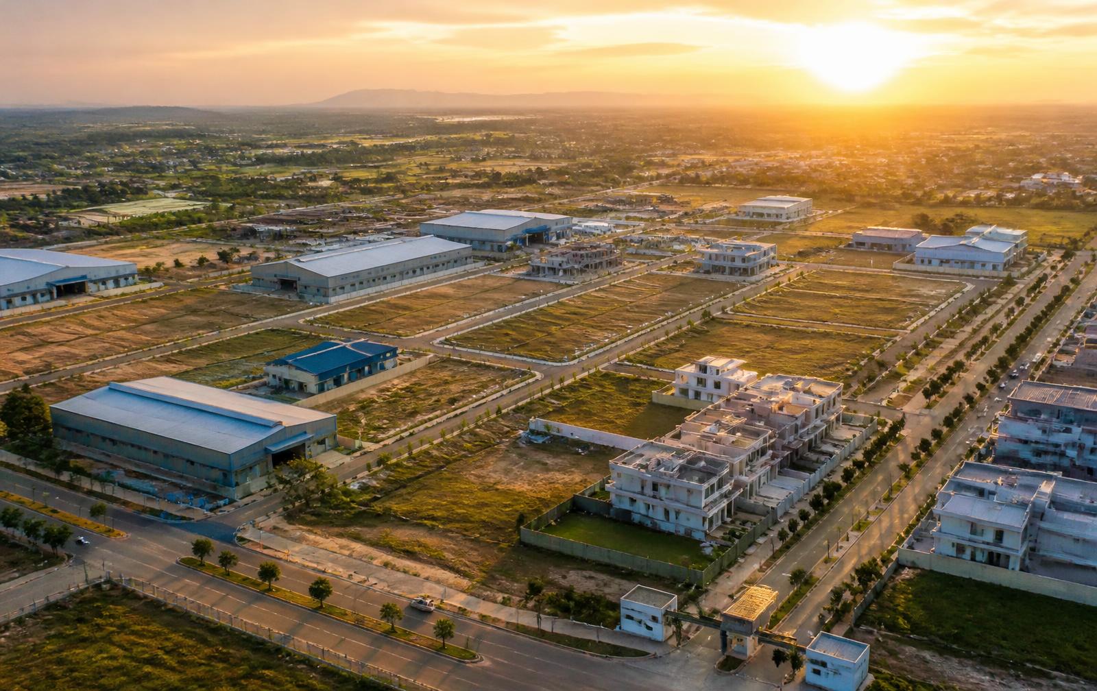 Plots, houses and industrial sheds in Pithampur at sunset